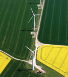 Image: Aerial view of wind turbines along edges of arable fields